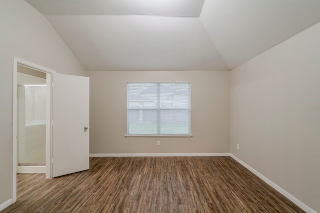 2511 Muscory Dr, Humble, TX 77396 - bonus room featuring vaulted ceiling, wood finished floors, and baseboards