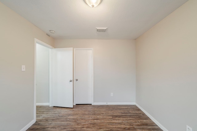 2511 Muscory Dr, Humble, TX 77396 - empty room with wood finished floors and baseboards