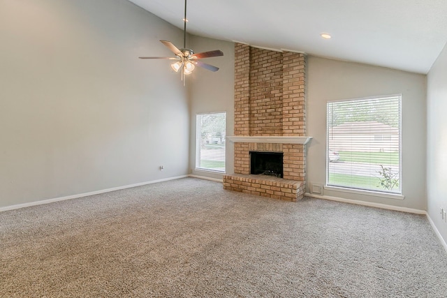 3014 Misty Park Dr, Houston, TX 77082 - unfurnished living room featuring carpet, ceiling fan, baseboards, a fireplace, and high vaulted ceiling