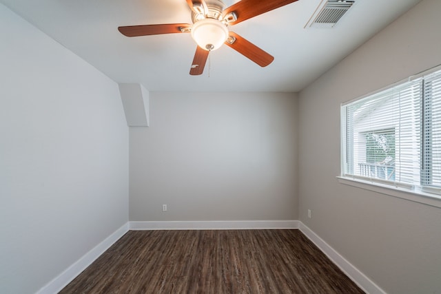 447 Vane Way, Crosby, TX 77532 - empty room with dark wood-type flooring, baseboards, and ceiling fan