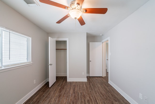 447 Vane Way, Crosby, TX 77532 - unfurnished bedroom featuring wood finished floors, baseboards, a closet, and ceiling fan