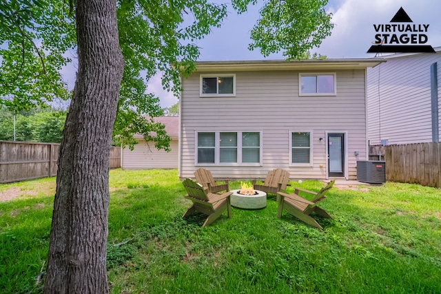 447 Vane Way, Crosby, TX 77532 - back of property featuring an outdoor fire pit
