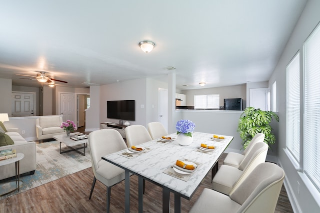 447 Vane Way, Crosby, TX 77532 - dining space with wood finished floors, ceiling fan, and baseboards