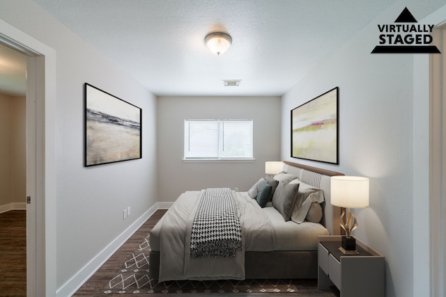 447 Vane Way, Crosby, TX 77532 - bedroom featuring dark wood-style floors and baseboards