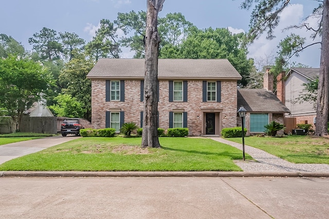 5206 Graystone Ln, Houston, TX 77069 - colonial inspired home featuring brick siding and driveway