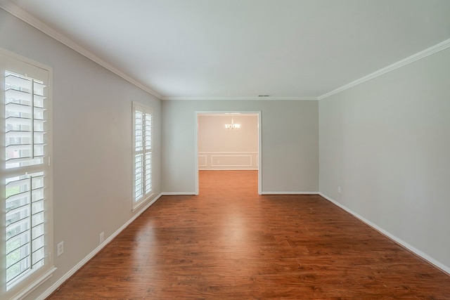 5206 Graystone Ln, Houston, TX 77069 - spare room with a chandelier, wood finished floors, ornamental molding, and baseboards