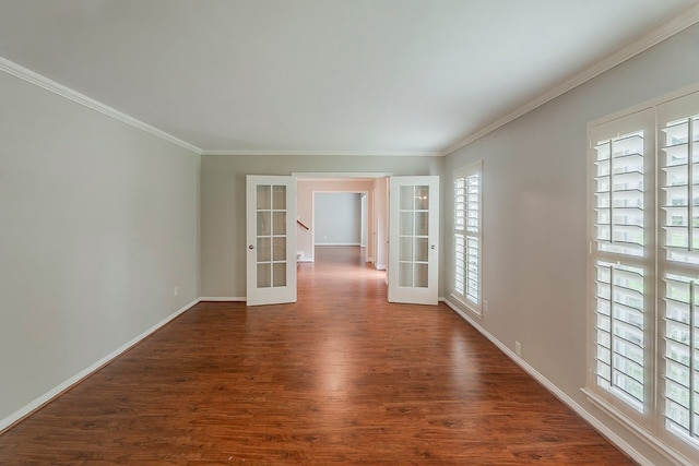 5206 Graystone Ln, Houston, TX 77069 - spare room featuring french doors, dark wood-type flooring, crown molding, and baseboards