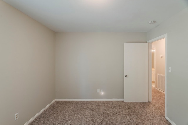 5206 Graystone Ln, Houston, TX 77069 - carpeted spare room featuring a smoke detector and baseboards