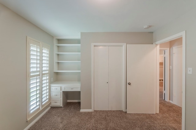 5206 Graystone Ln, Houston, TX 77069 - unfurnished bedroom with carpet flooring, an office area, and a closet