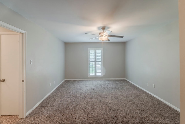 5206 Graystone Ln, Houston, TX 77069 - empty room featuring carpet flooring, ceiling fan, and baseboards