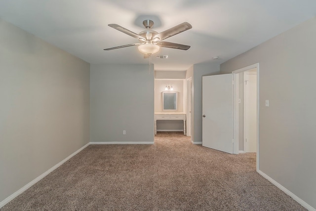 5206 Graystone Ln, Houston, TX 77069 - unfurnished bedroom with carpet floors, baseboards, and a ceiling fan