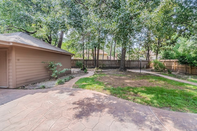 5206 Graystone Ln, Houston, TX 77069 - fenced backyard with a patio area
