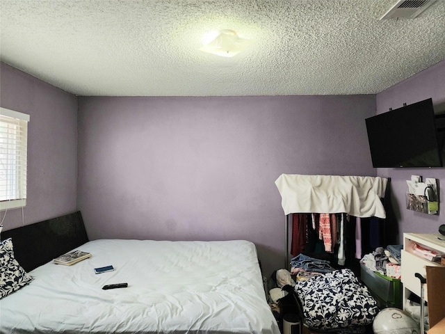 6822 Zapata Dr, Houston, TX 77083 - bedroom with a textured ceiling