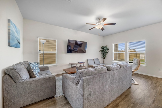 6846 Termino Ln, Rosharon, TX 77583 - living room featuring wood finished floors, a ceiling fan, and baseboards
