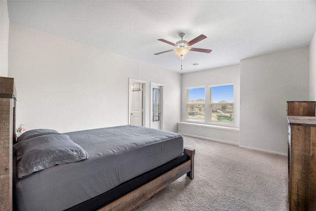 6846 Termino Ln, Rosharon, TX 77583 - carpeted bedroom with baseboards and ceiling fan
