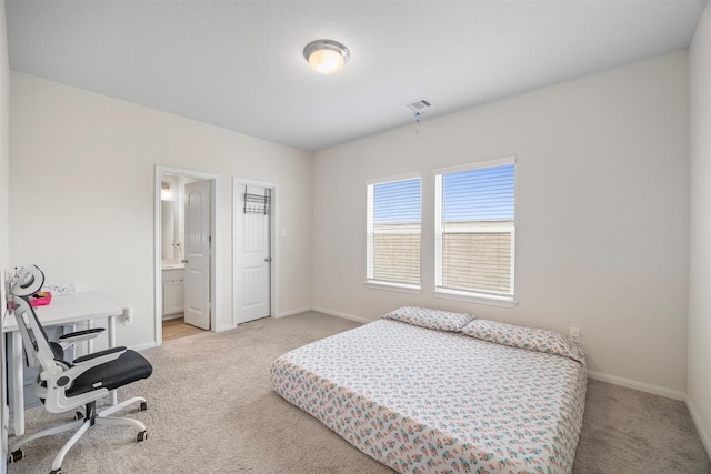 6846 Termino Ln, Rosharon, TX 77583 - carpeted bedroom with baseboards and ensuite bath