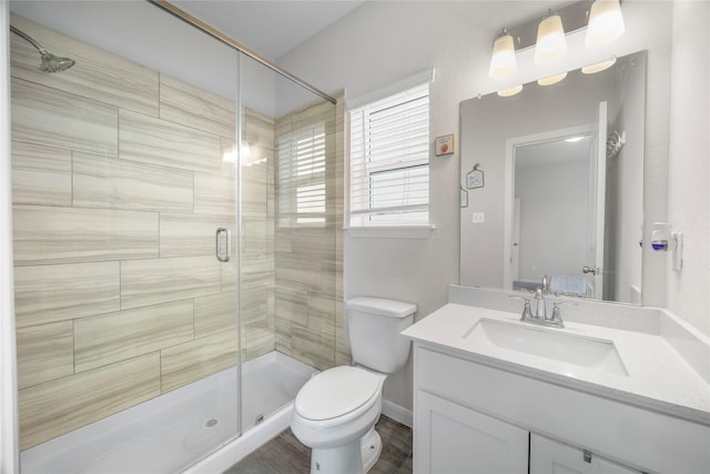 6846 Termino Ln, Rosharon, TX 77583 - bathroom featuring vanity, a shower stall, and toilet