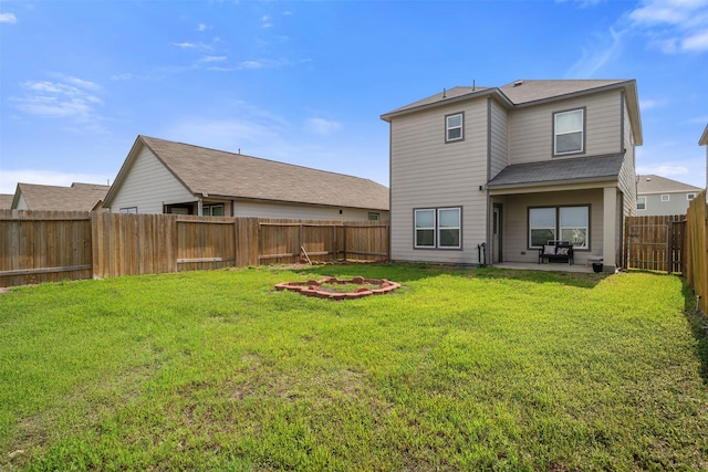 6846 Termino Ln, Rosharon, TX 77583 - rear view of property featuring a patio area and roof with shingles