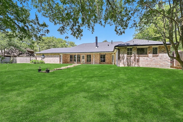 704 Balmoral Ct, Friendswood, TX 77546 - back of property featuring brick siding