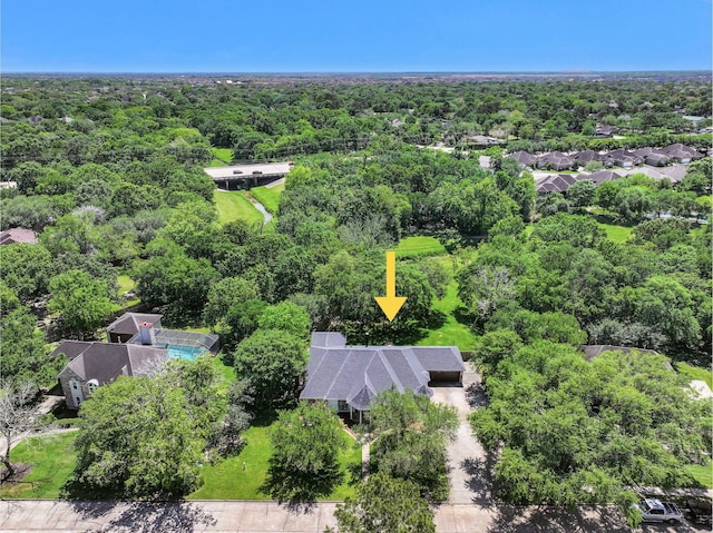 704 Balmoral Ct, Friendswood, TX 77546 - drone / aerial view of a heavily wooded area