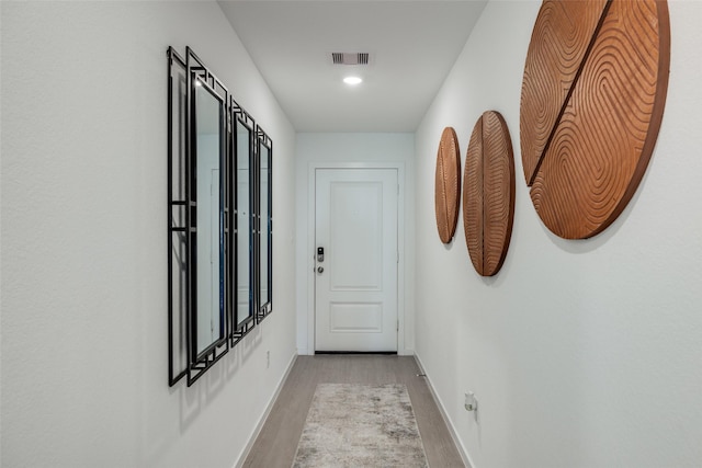 277 Douglas Hills Dr, Magnolia, TX 77354 - corridor with wood finished floors and baseboards