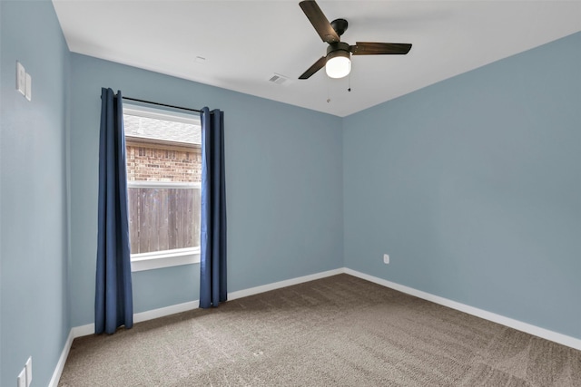 12307 Sabine Point Dr, Humble, TX 77346 - unfurnished room featuring carpet flooring, a ceiling fan, and baseboards