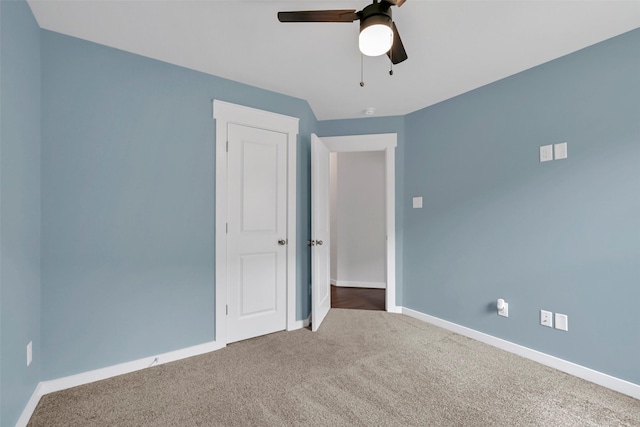 12307 Sabine Point Dr, Humble, TX 77346 - carpeted spare room featuring a ceiling fan and baseboards