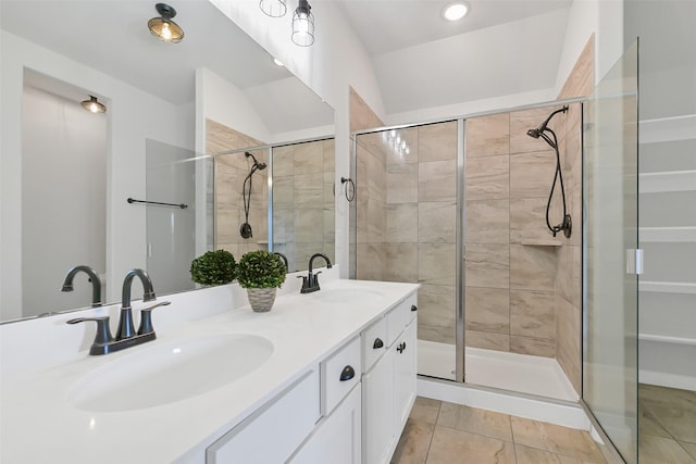 12307 Sabine Point Dr, Humble, TX 77346 - full bathroom with a shower stall, double vanity, and recessed lighting