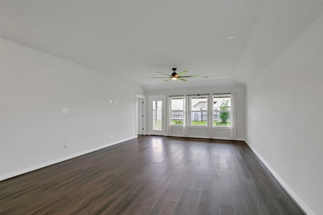 12307 Sabine Point Dr, Humble, TX 77346 - spare room with dark wood-style floors, ceiling fan, baseboards, and lofted ceiling