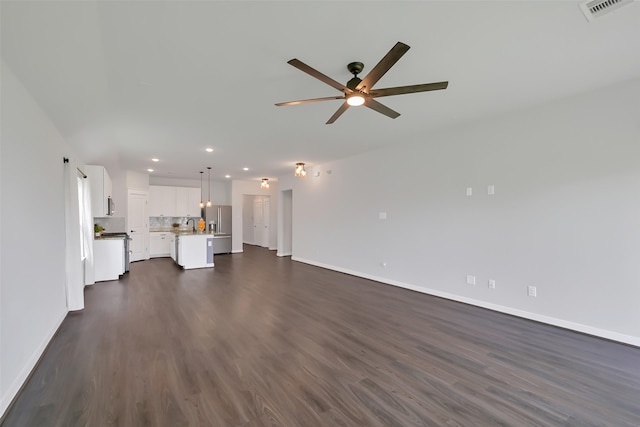 12307 Sabine Point Dr, Humble, TX 77346 - unfurnished living room with recessed lighting, dark wood finished floors, baseboards, and ceiling fan