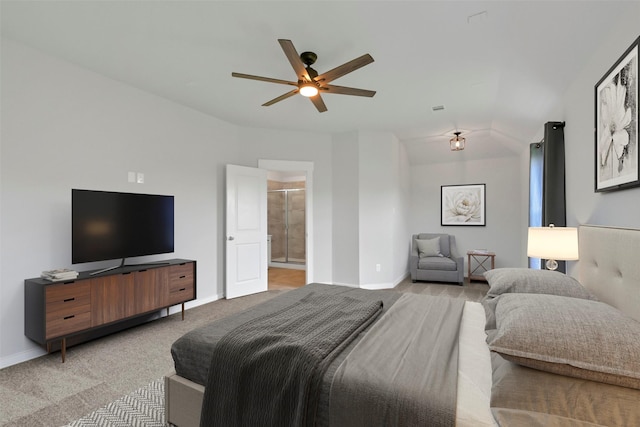 12307 Sabine Point Dr, Humble, TX 77346 - bedroom featuring light colored carpet, baseboards, ensuite bath, a ceiling fan, and lofted ceiling