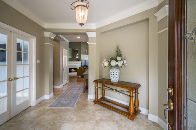 11802 Rue Saint Honore Ct, Tomball, TX 77377 - entrance foyer featuring french doors, ornamental molding, a warm lit fireplace, light tile patterned floors, and baseboards