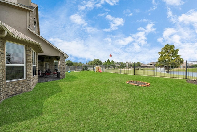 22714 Wilbur Ln, Tomball, TX 77375 - view of yard featuring a water view and a patio