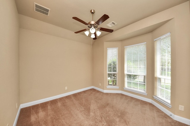 22714 Wilbur Ln, Tomball, TX 77375 - carpeted empty room featuring baseboards and a ceiling fan