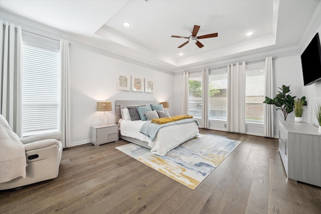 1120 Wakefield Dr, Houston, TX 77018 - bedroom featuring a raised ceiling, ornamental molding, hardwood / wood-style floors, recessed lighting, and ceiling fan