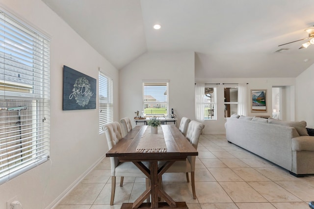 9998 Chimney Swift Ln, Conroe, TX 77385 - dining room with vaulted ceiling, ceiling fan, light tile patterned floors, and baseboards