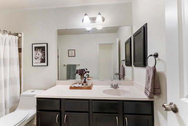 9998 Chimney Swift Ln, Conroe, TX 77385 - bathroom with toilet, vanity, and curtained shower