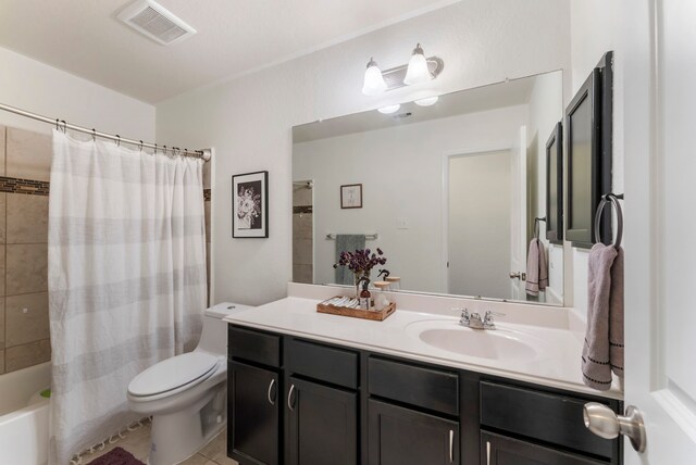 9998 Chimney Swift Ln, Conroe, TX 77385 - full bathroom with toilet, vanity, shower / tub combo with curtain, and tile patterned flooring