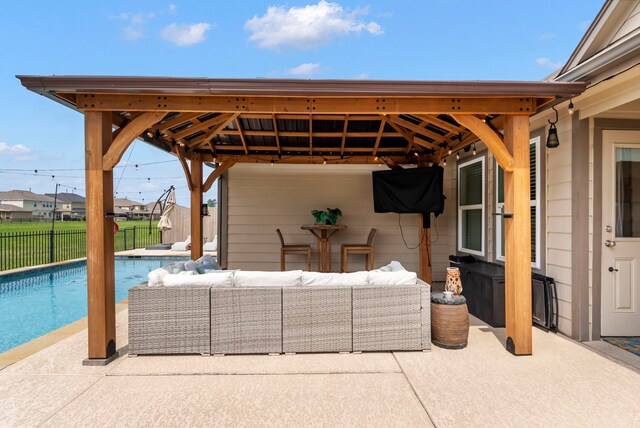 9998 Chimney Swift Ln, Conroe, TX 77385 - view of patio / terrace with outdoor lounge area and a gazebo