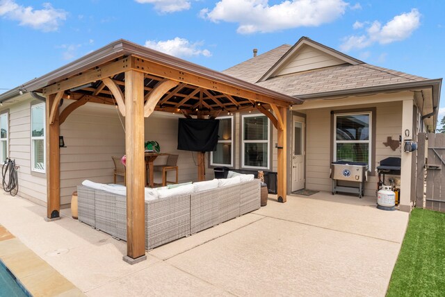 9998 Chimney Swift Ln, Conroe, TX 77385 - view of patio with a gazebo, an outdoor hangout area, and a grill