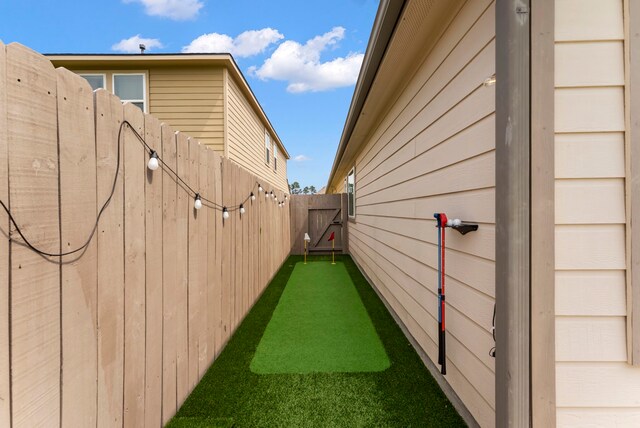 9998 Chimney Swift Ln, Conroe, TX 77385 - view of yard with an area to practice putting