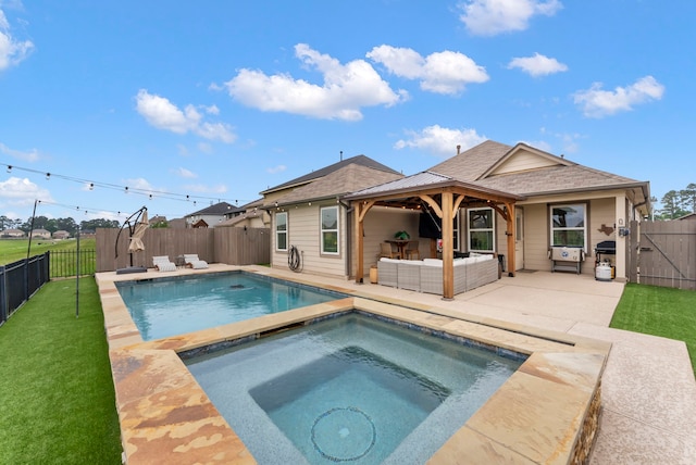 9998 Chimney Swift Ln, Conroe, TX 77385 - view of pool featuring an outdoor living space, an in-ground hot tub, a gazebo, a patio, and a gate