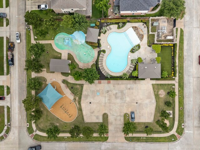 9998 Chimney Swift Ln, Conroe, TX 77385 - aerial view of property's location with a pool