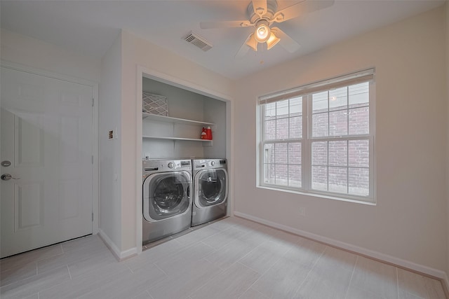 4823 Sunshine Dr, Sugar Land, TX 77479 - laundry room with washer and dryer, a ceiling fan, and baseboards