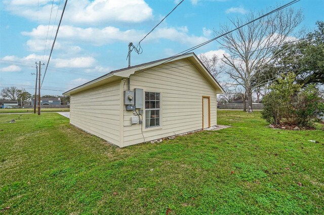 4418 W Pasadena Blvd, Deer Park, TX 77536 - view of side of property featuring a lawn