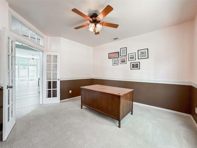 6081 Trent Ct, League City, TX 77573 - carpeted home office with french doors, ceiling fan, and baseboards