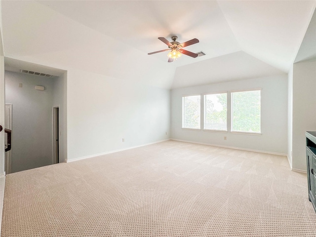 6081 Trent Ct, League City, TX 77573 - unfurnished living room with a ceiling fan, light carpet, lofted ceiling, and baseboards