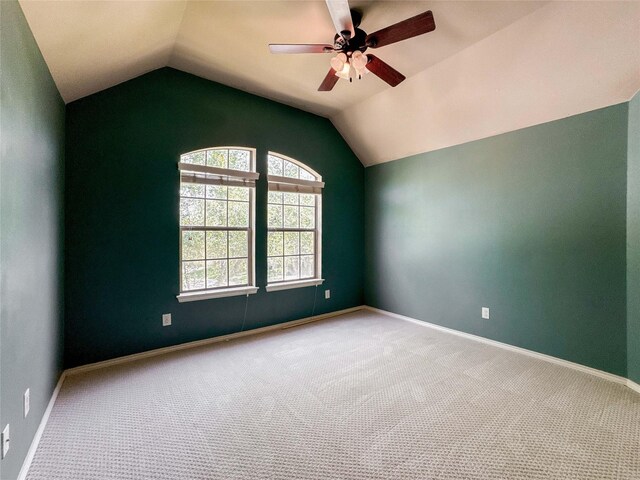 6081 Trent Ct, League City, TX 77573 - empty room featuring vaulted ceiling, a ceiling fan, carpet flooring, and baseboards