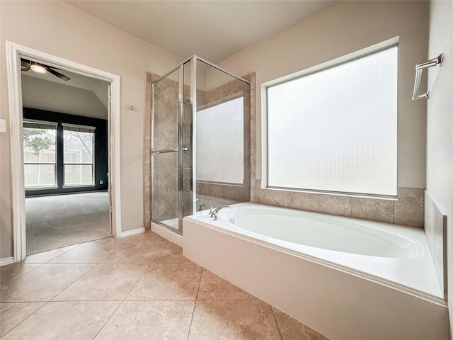 6081 Trent Ct, League City, TX 77573 - full bathroom featuring a bath, a shower stall, tile patterned flooring, ceiling fan, and baseboards