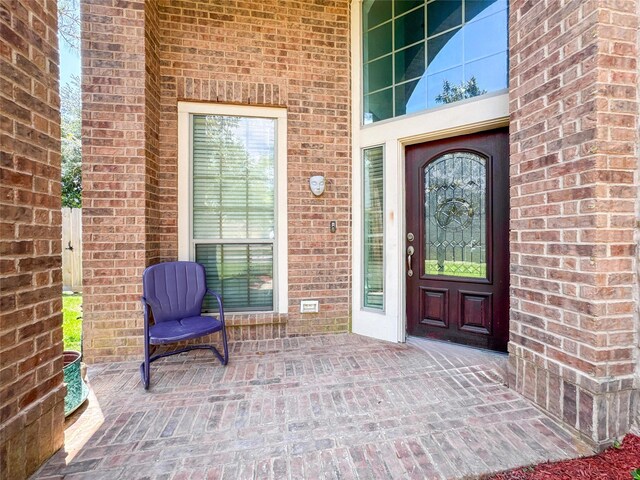 6081 Trent Ct, League City, TX 77573 - property entrance featuring brick siding